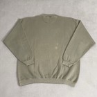 Olive green vintage Eddie Bauer sweatshirt size L with white text, brown hip hop stain, and ribbed cuffs.
