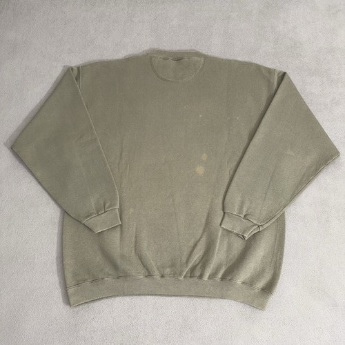 Olive green vintage Eddie Bauer sweatshirt size L with white text, brown hip hop stain, and ribbed cuffs.