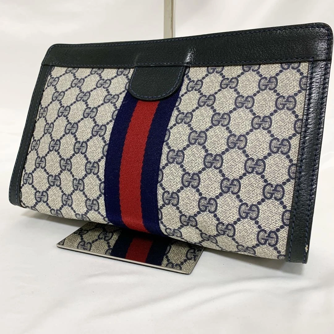 Sac pochette collection accessoires Gucci bleu marine bon état