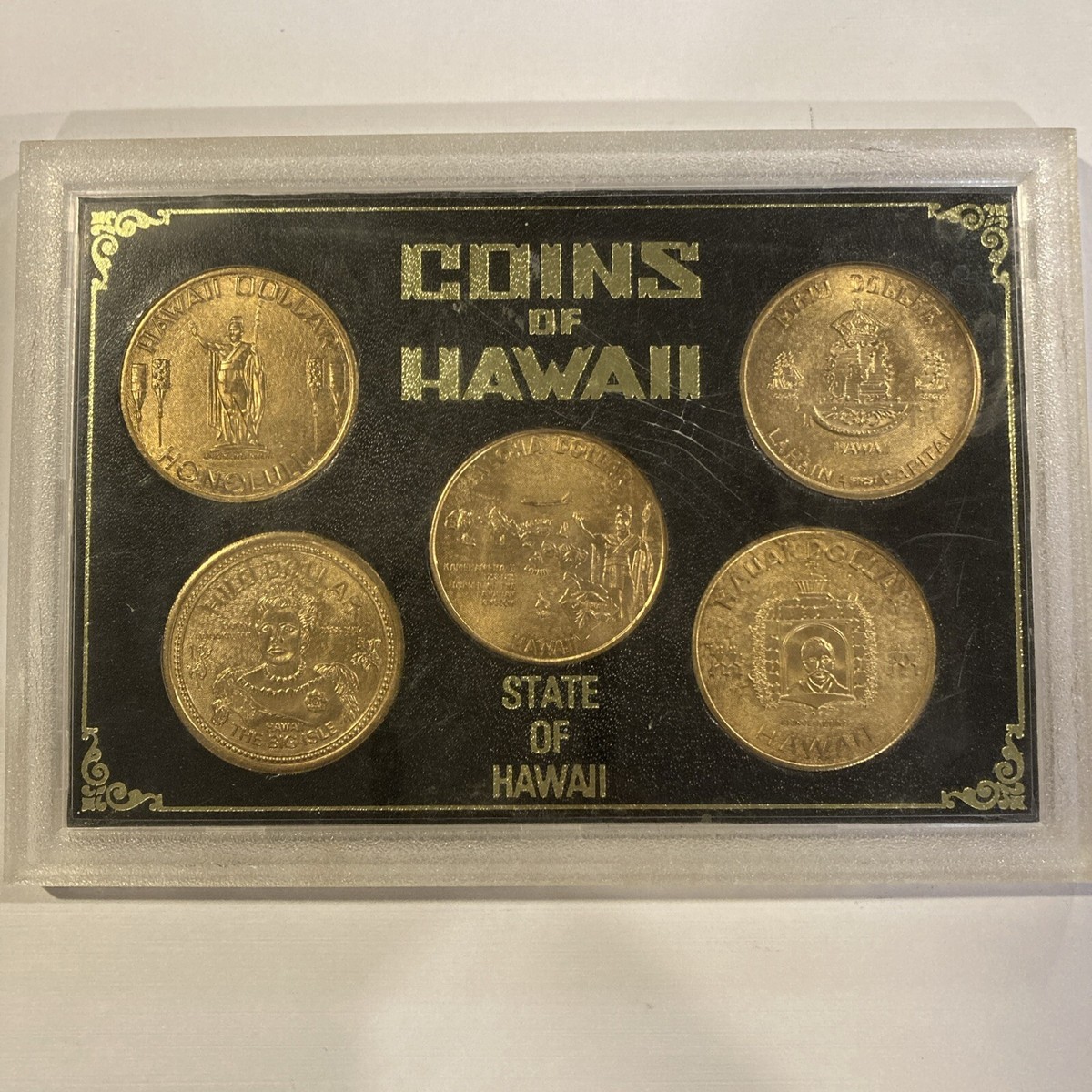 COINS OF HAWAII FIVE TOKEN DOLLAR SET IN ORIGINAL FRAME AND