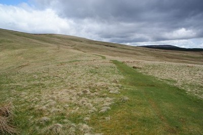 Photo A2 Path up to Windy Gyle Russell's Cairn Continuing the steady plo c2013