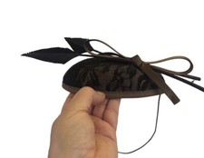 Lace and feather fascinator .