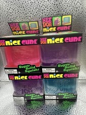 NeeDoh. Nice Cube. Set Of 4. 1 Pink,1 blue, And 2 Purple.