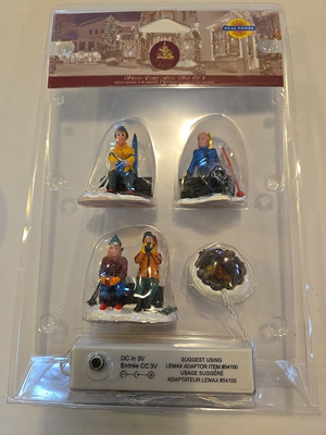 LEMAX  Skiers Camp Fire Lighted Holiday Village Set Of 4 New In Package BO Or AC
