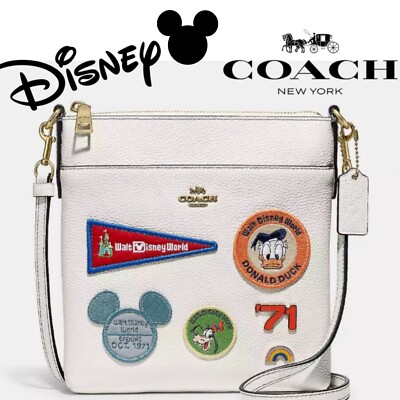 Coach x Disney Kitt Messenger crossbody with patches brass chalk