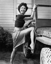 Dorothy Dandridge shows some leg as she gets in Jeep 24x36 Poster  inch poster