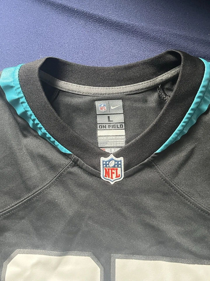 Camiseta deportiva de los Jacksonville Jaguars #85 Tim Tebow Nike NFL-Juvenil Grande-¡Bonita! Foto 2 de 4
