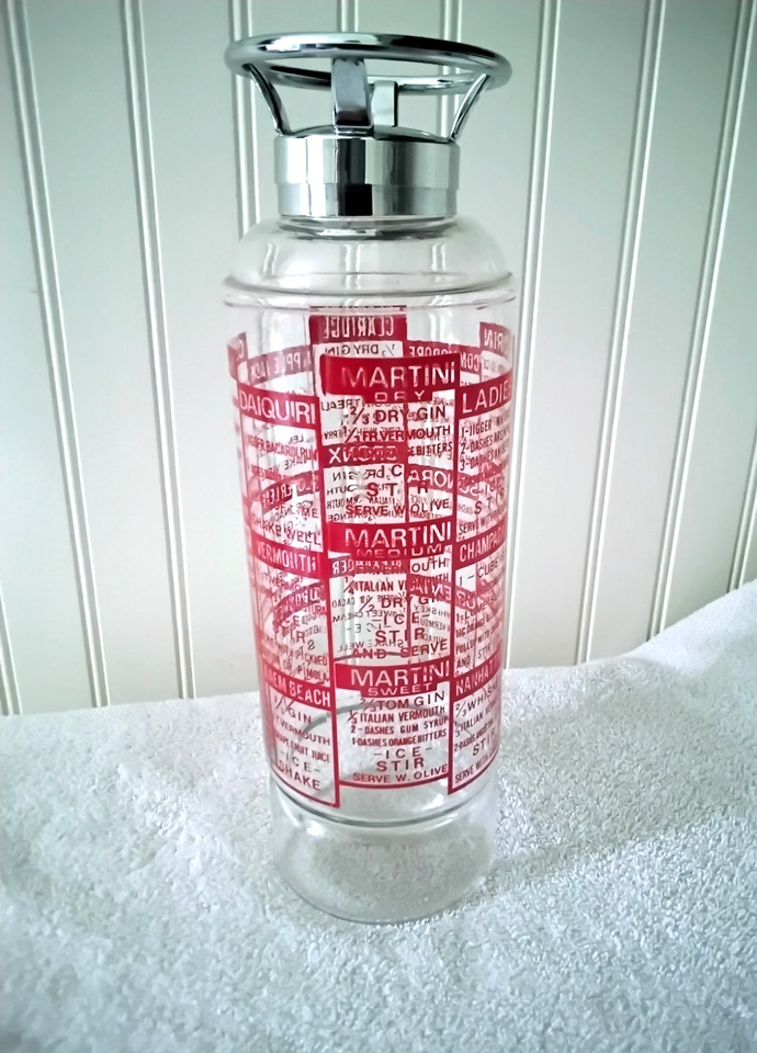 A genuine vintage cocktail shaker shaped exactly like a fire extinguisher — genuinely rare Paden City Glass Co. piece that stops every guest cold.