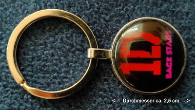 One Direction 1D Schlüsselanhänger schwarz-rot ''Backstage''