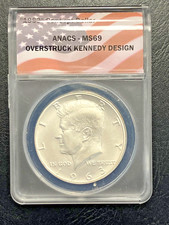 1963 OVERSTRUCK KENNEDY CONCEPT DOLLAR DESIGN ANACS MS69 BIN FREE SHIPPING