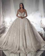 Elegant A-Line Sequin Wedding Dresses Boat Neck Long Sleeved Lace Bridal Gowns