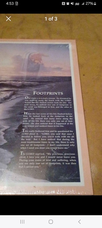 Footprints poem still in film wrap to display on wall