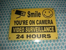 SMILE YOU'RE ON CAMERA Yellow Business Security Sign 7" W x 5" H.