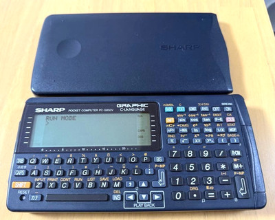 Junk Sharp PC-G850V Pocket Computer Calculator Melted marks on the back Working