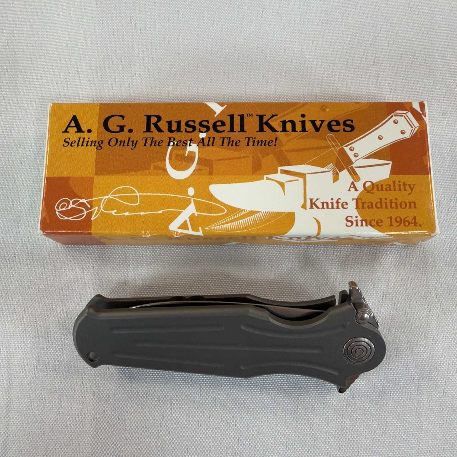 A.G. Russell 2004 Folding Sting Titanium Frame Lock Knife 154CM AGST-F334T Box