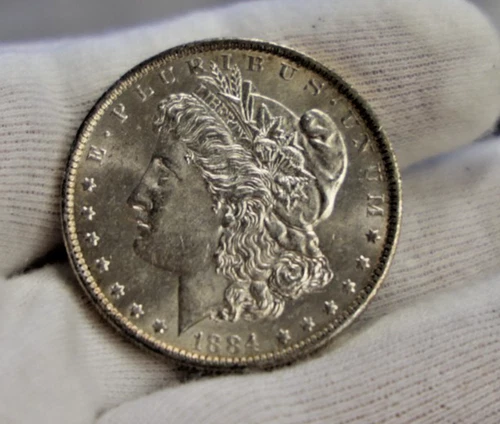 1884 O US Morgan Silver Dollar $1 AU+