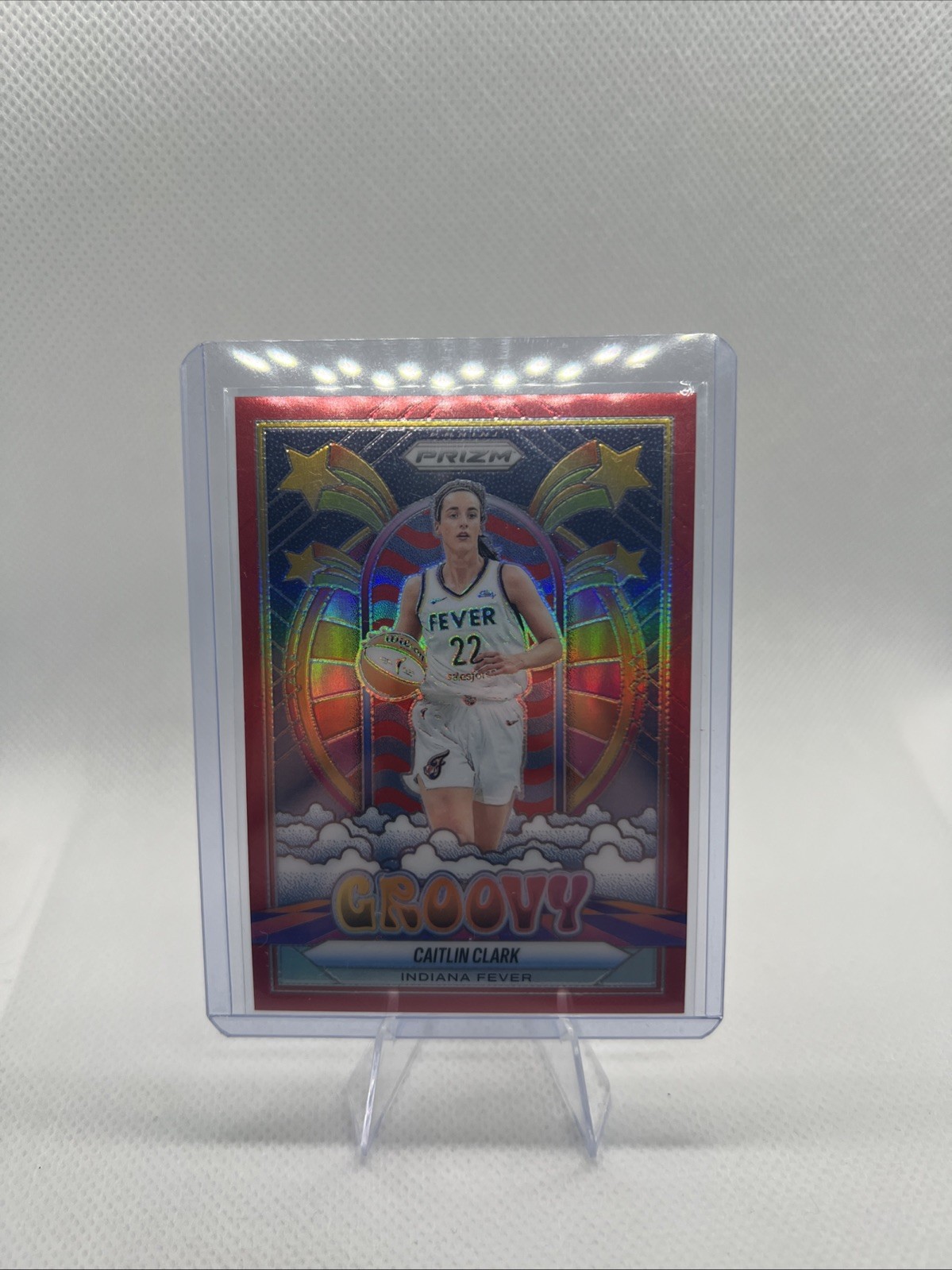 2025 Panini WNBA Prizm Caitlin Clark Groovy Red Prizm /99 Fever #10 Insert