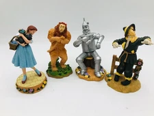 WIZARD OF OZ FIGURINES ENESCO 1999 Set Of 4 Resin Dorothy Lion Tin Man Scarecrow