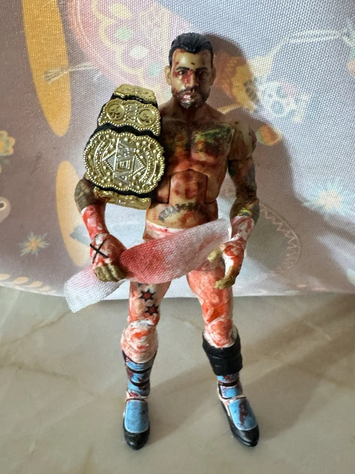 WWE AEW CM Punk “Brawl Out” Personalizado Foto 3 de 4