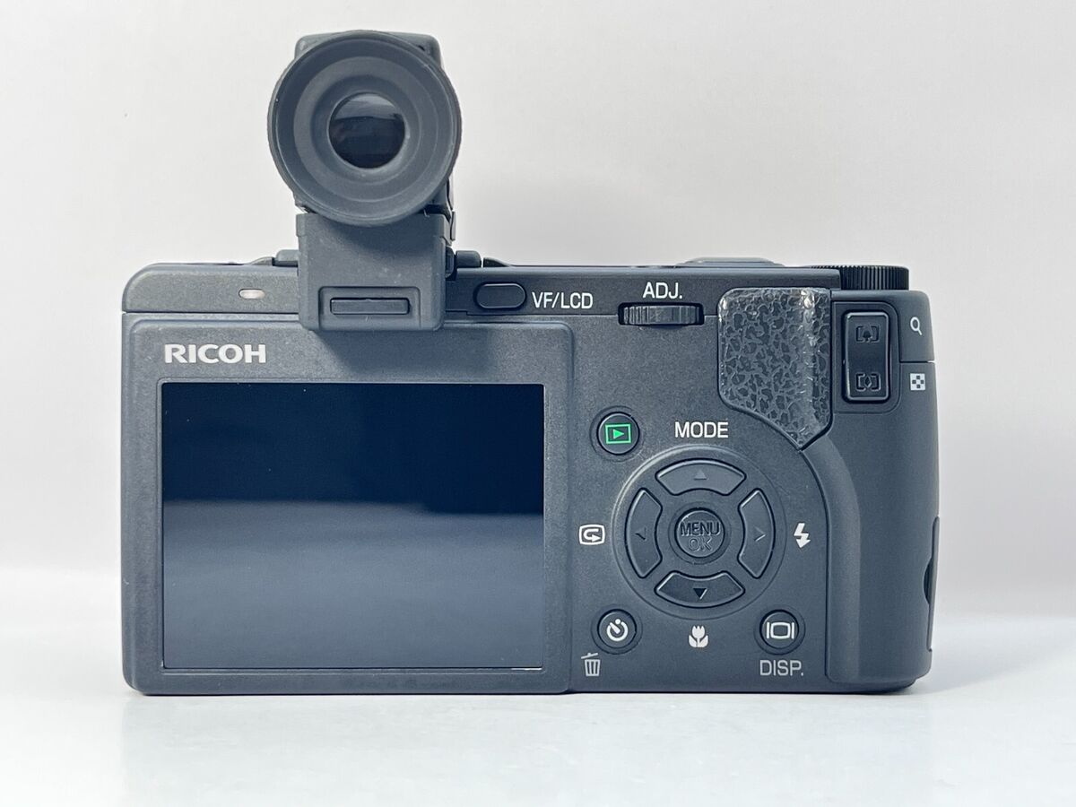 Ricoh Caplio GX100 VF KIT 10.0MP Digital Camera - Black B011 Ricoh Caplio GX100 VF KIT 10.0MP Digital Camera - Black B011