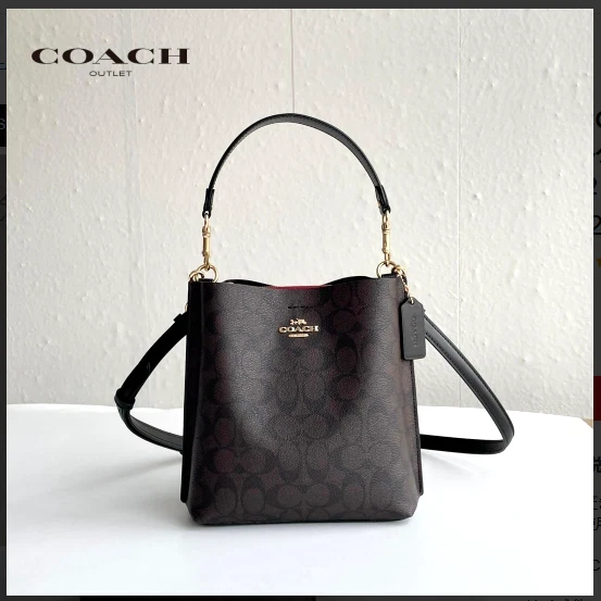Borsa a secchiello Coach Ca582 marrone nero oro Molly 22 firma tela outlet nuova
