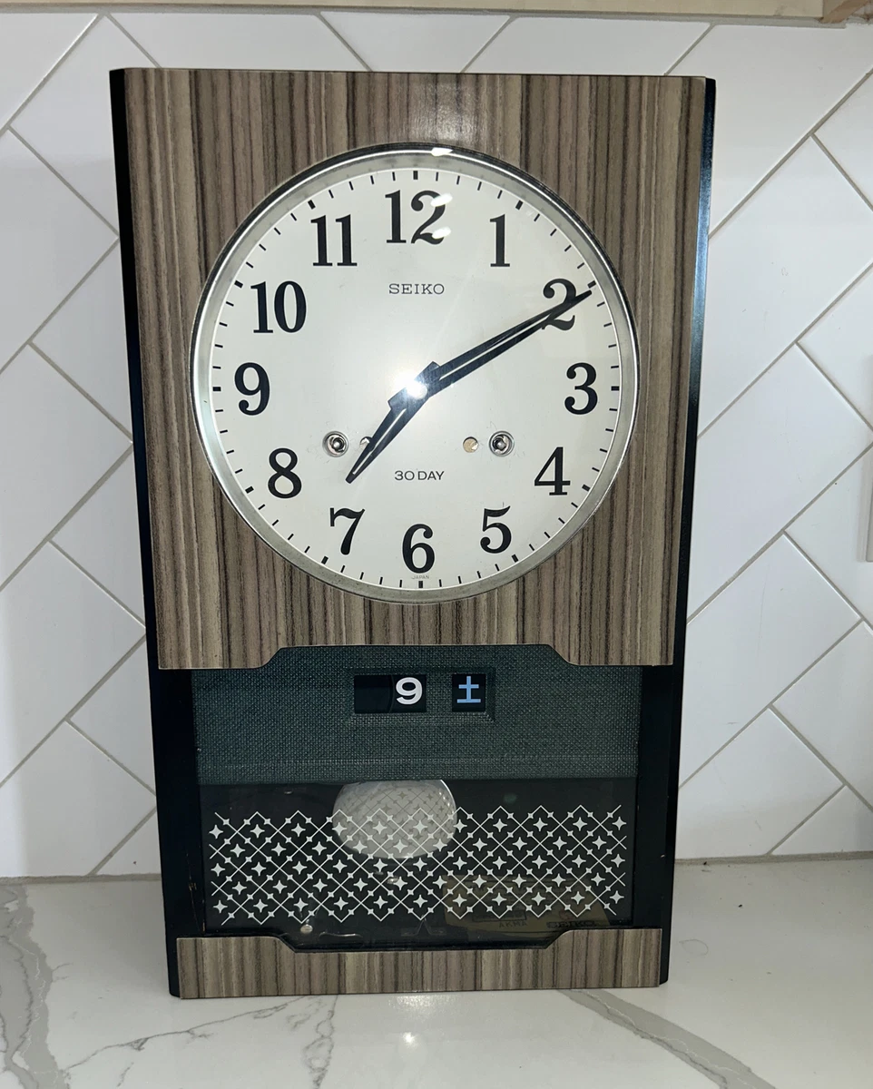 seiko day date wall clock
