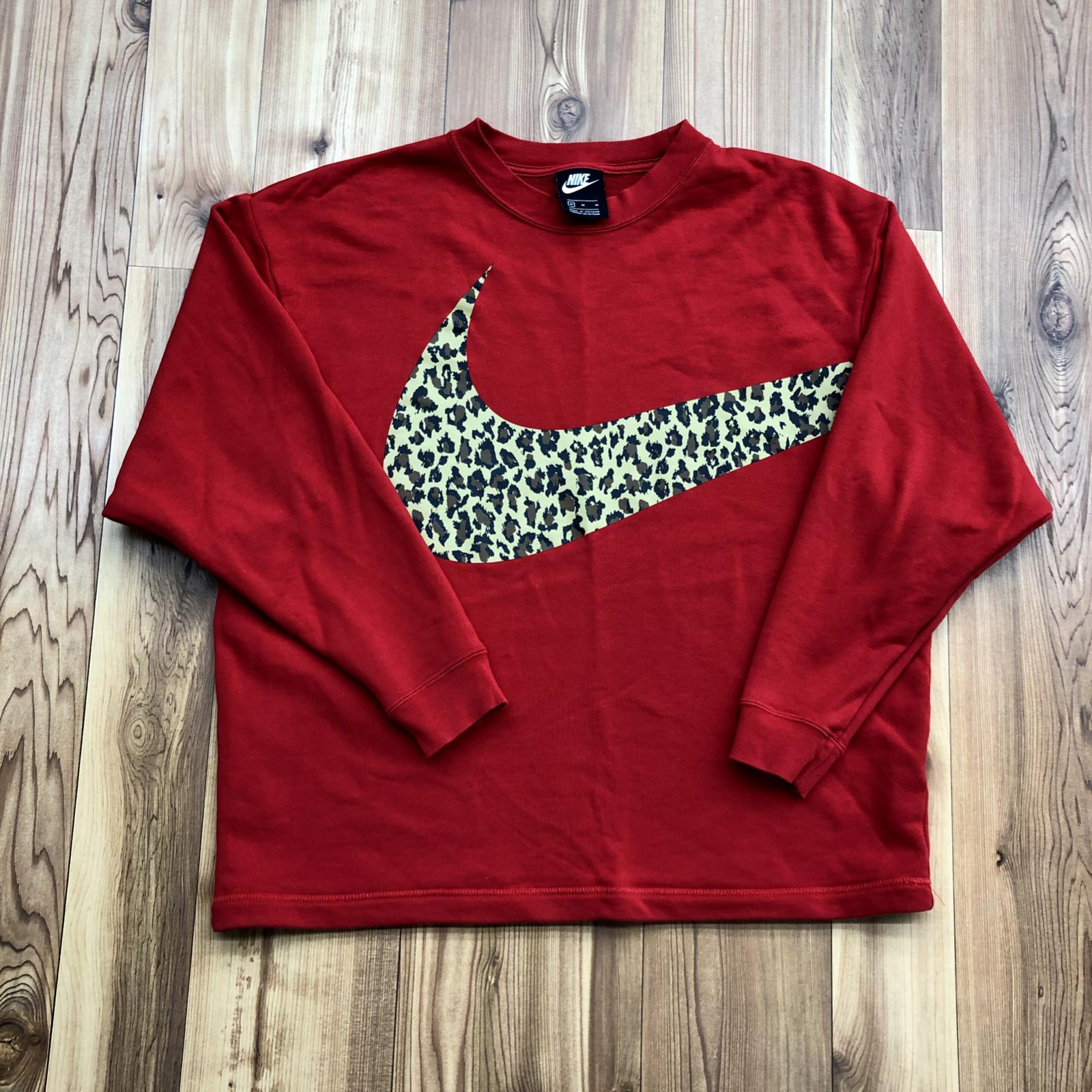 red cheetah nike shirt