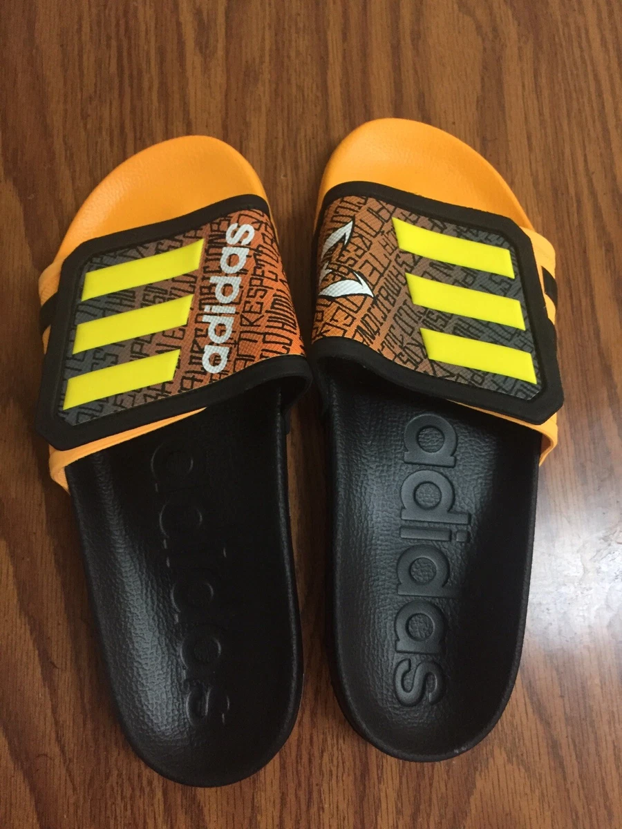 Adidas orange best sale flip flops