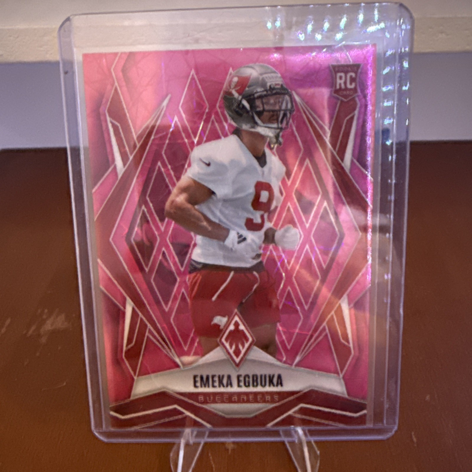 2025 Panini Phoenix - Rookies Emeka Egbuka #225 Pink Lazer /149 (RC)