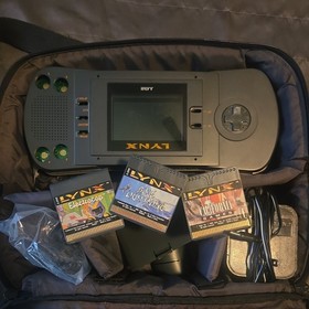 Atari Lynx Handheld Console w-games  Charger, Case