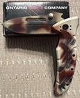 ONTARIO KNIFE COMPANY 08760 XM-1D EXTREME MILITARY DESERT CAMO NSN on Blade