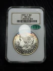 1883-O Morgan Silver Dollar MS 64 CAC. Old NGC “Fatty”, Rainbow Crescent Toning