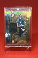 2021 Panini Gold Standard - Newly Minted Trevor Lawrence #NMM-TL /299 (MEM, RC)