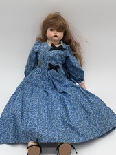 vintage reproduction of an antique SFBJ 252 "Pouty" character doll