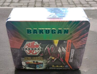 New Sealed Bakugan Baku-Tin Set ~ 2 Figures  4 Bakucores  2 Character Cards