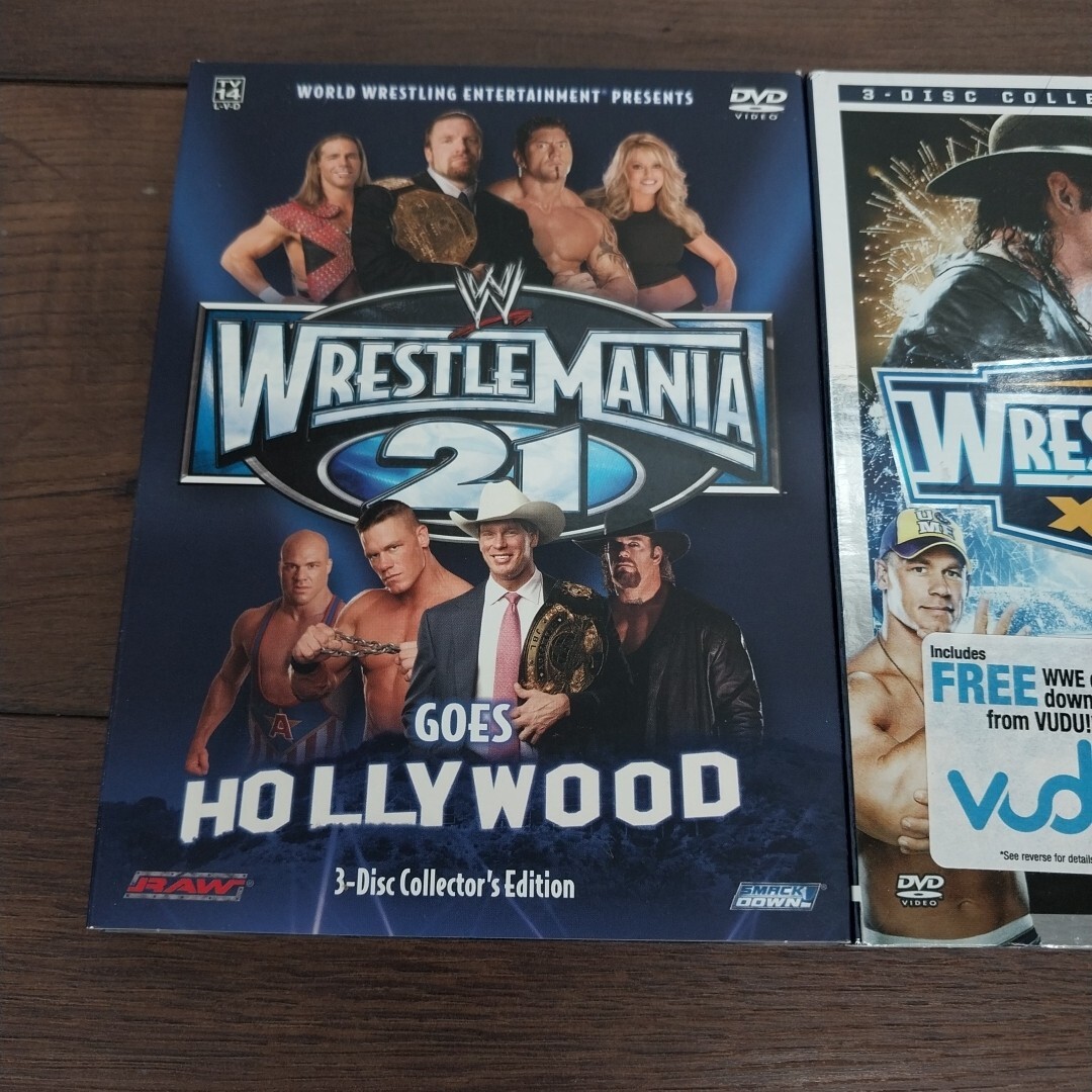WWE: WrestleMania 21 And 27 DVD 3 Disc Sets. 6 Discs Total