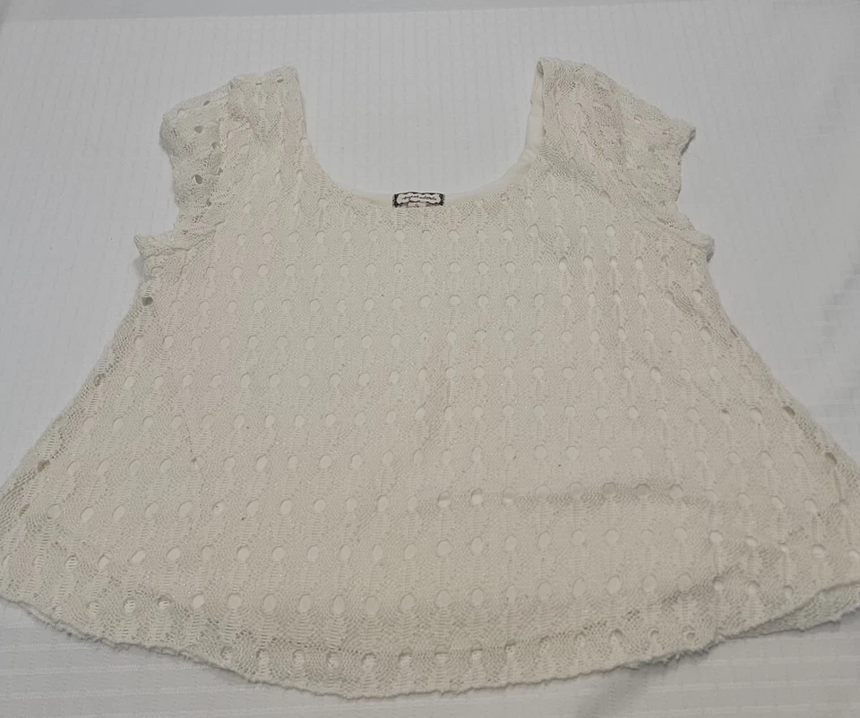 Suéter para mujer marca sombra de ojos manga corta color crema talla pequeña Foto 2 de 4