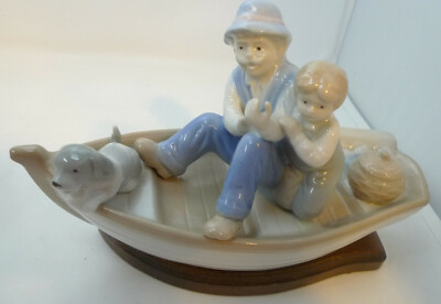 boy fishing figurine