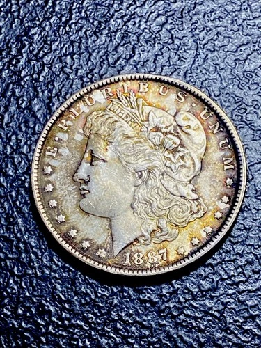 F54💎 1887 $1 Morgan Silver Dollar UNIQUE Gold Rim TONING UNC