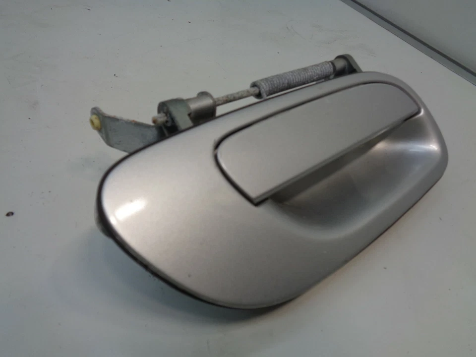 Manija de puerta exterior de pasajero trasero derecho Volvo S60 2001-2009 plateada OEM AK91105 Foto 2 de 4