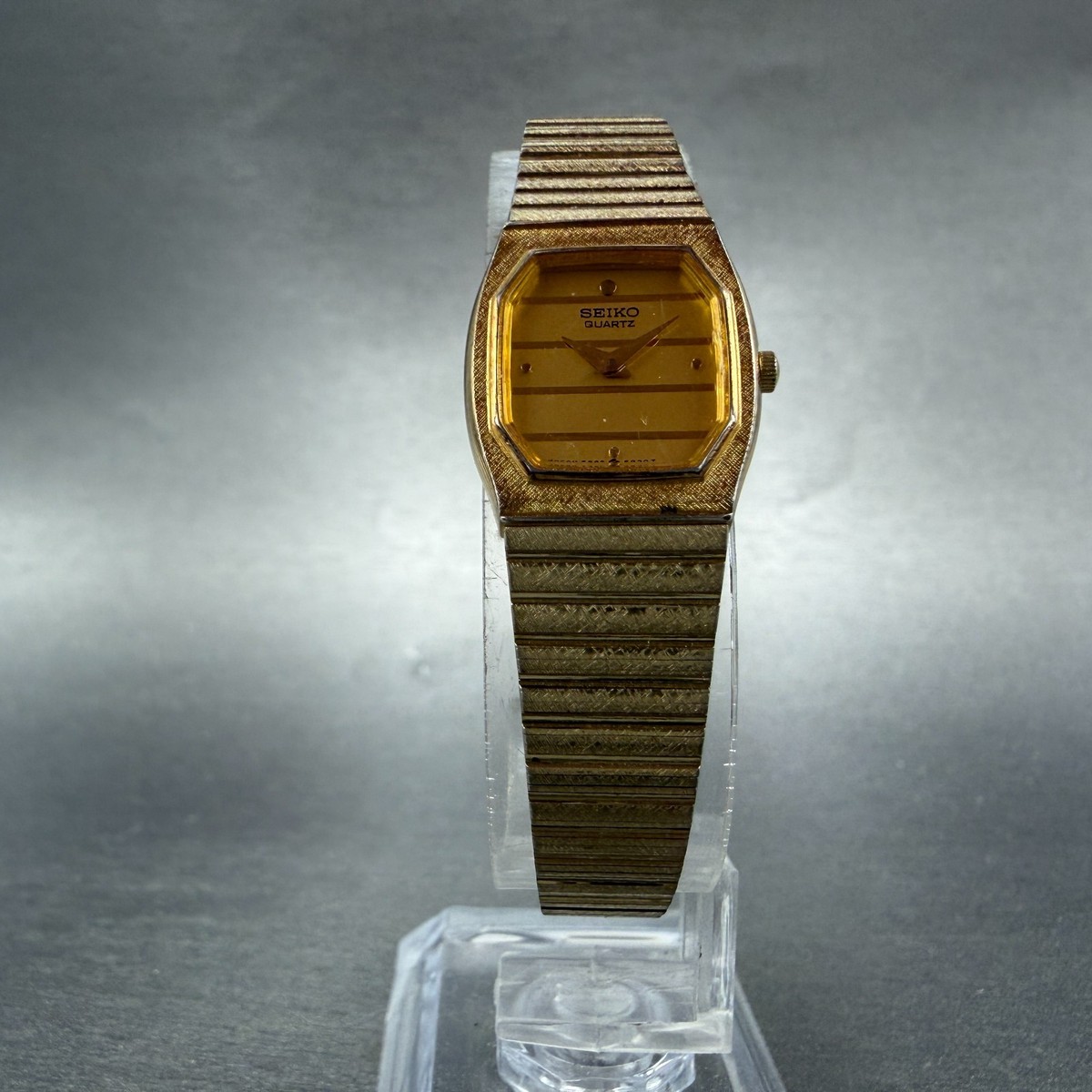 Seiko Watch Women 18mm Champagne Dial Gold Tone Rectangle 7320