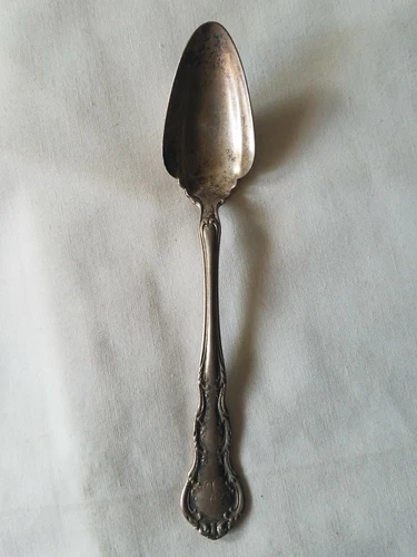 IRVING 5 3/4" FRUIT SPOON - monogrammed 'L' -- Wallace Sterling - estate