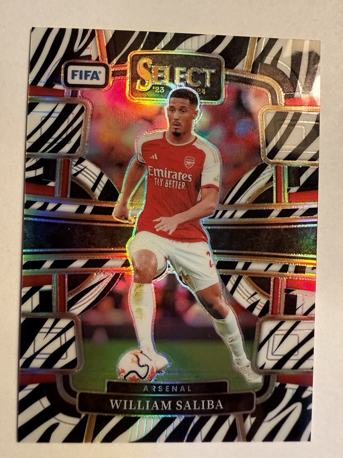 2023-24 Panini Select FIFA William Saliba ZEBRA PRIZM Terrace /25