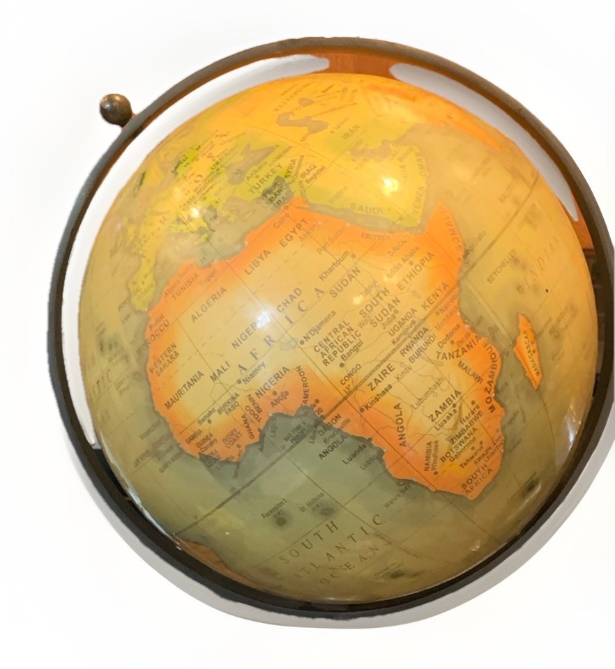 A 22-inch metal tripod globe with Old World cartography styling — instant desk or shelf statement piece for under $20.