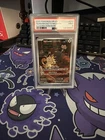 2025 Pokemon DRI EN Ilustration Rare #203 Team Rocket's Meowth PSA 9
