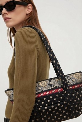 Vera Bradley tote bag featuring a retired black floral pattern Quilt Shoulder  