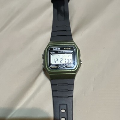 Casio F-91W Digital Quartz Alarm Chronograph Watch Green Case Black Resin 34mm