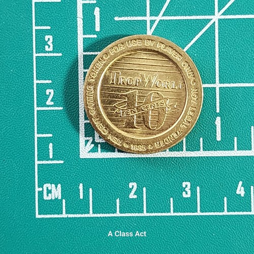 Token de juego Trop World Casino 10 centavos de Atlantic City. Our T5913 - Imagen 4 de 4