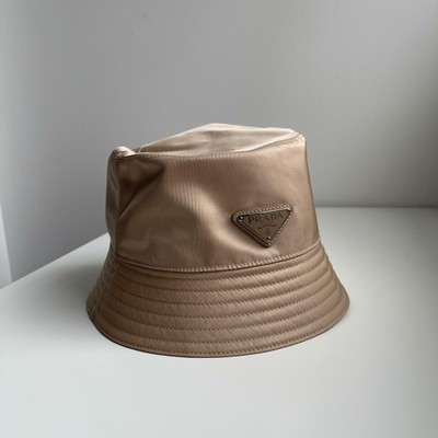 beige prada bucket hat