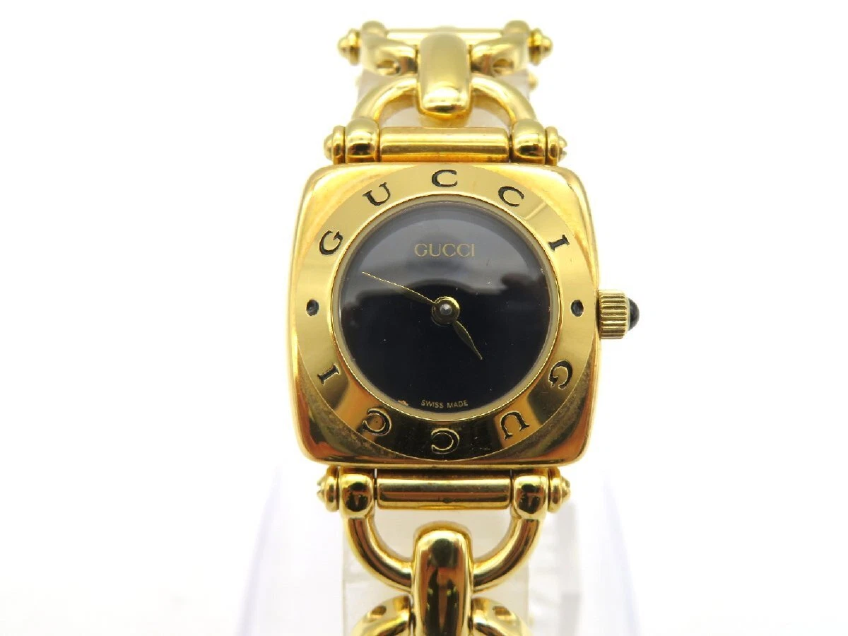 Montre femme GUCCI 6400L quartz or fabrication suisse cadran noir vintage 1 jour/F/S comme neuve